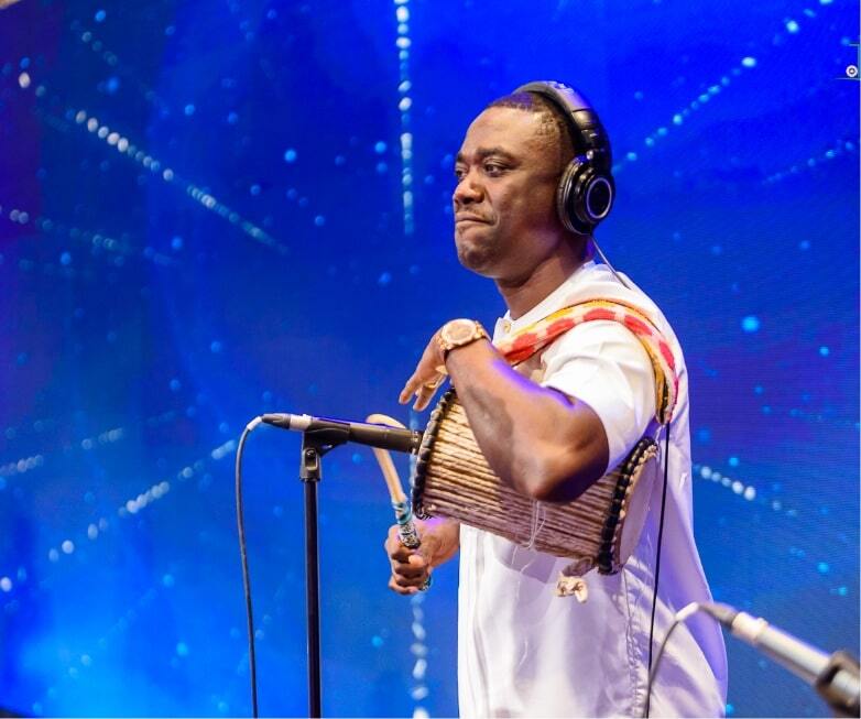 man performing performing traditional drum music at RCCG